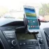 Suport universal pentru telefon, montare în fanta CD-ului