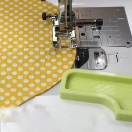   Ghid de cusut, Dispozitiv de poziționare pentru mașina de cusut