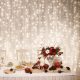 Home DLFC 600/WW Cortină de lumini LED cluster, 2,7x0,6 m / 600 LED-uri alb cald, lumină fixă, cablu alb, extensibilă, pentru exterior și interior