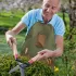 Șorț din material textil cu mai multe buzunare și protecție pentru picioare
