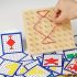 Geoboard educativ din lemn cu benzi de cauciuc
