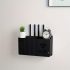 Router montat pe perete și set top box box de stocare