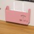 Router montat pe perete și set top box box de stocare